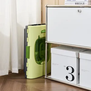 Foldable green portable pet carrier for cats and dogs stored neatly in a home setting