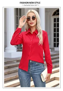 Elegant woman wearing a vibrant red long-sleeved button-down casual shirt outdoors