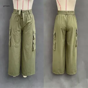 Front and back detail views of green wide-leg cargo pants with multiple pockets