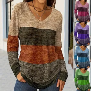 Detail view of long-sleeve V-neck striped knit top showing multiple color variants
