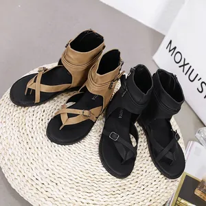 Detailed view of stylish women's gladiator sandals available in tan and black colors.