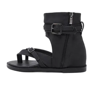 Black gladiator flat sandals for women featuring stylish buckle and zipper side detail
