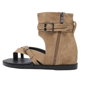 Detailed side view of women's khaki Roman sandals with ankle buckle and zipper.