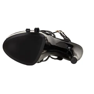 Black 17cm platform stiletto sandals with shiny patent finish for catwalks.