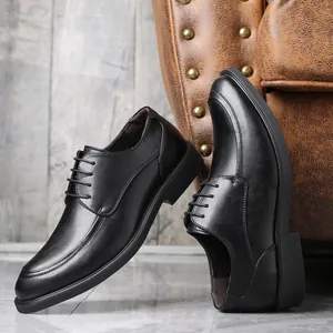 Classic black men's business leather shoes with lace-up design in office setting