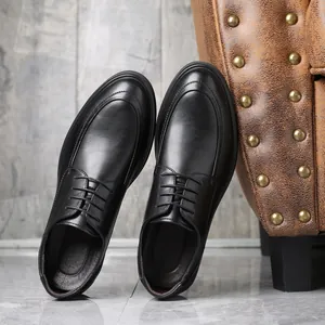 Detailed side view of premium black lace-up leather shoes for formal business attire