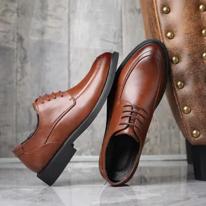 Elegant brown leather business dress shoes for men featuring classic lace-up design
