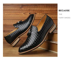 Detailansicht der schwarzen geflochtenen Leder-Loafer mit eleganten Quastenakzenten