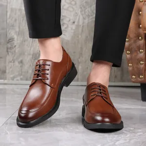 Classic brown leather oxford shoes for men in a formal business style with lace-up design