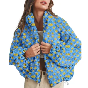 Detail view of stylish women's blue and yellow checkered fleece jacket with a loose fit