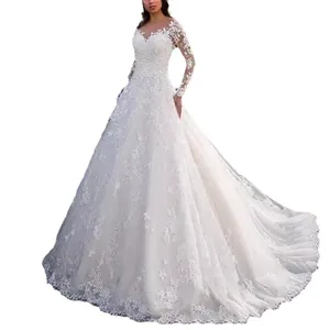 Elegant long sleeve lace wedding dress with a floral cathedral train for brides