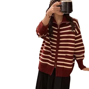 Women's loose red and white striped knit cardigan with lapel collar and zipper closure.