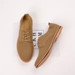 Premium men's tan suede leather lace-up casual shoes showing refined stitching details