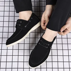 Men's black suede casual loafers with British style design shown in a wearing view