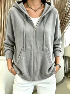 Detailed view of women's gray hooded zip knit cardigan with soft texture and relaxed fit