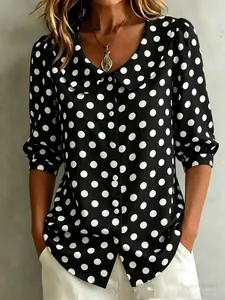 Élégante blouse noire à pois blancs pour femmes avec manches mi-longues et col à revers