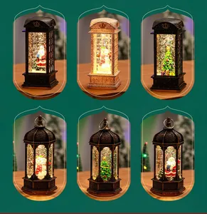 Detailed view of various glowing Christmas phone booth and vintage lantern ornaments