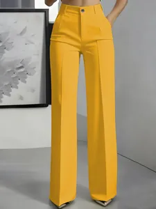 Close-up of vibrant yellow high-waisted wide-leg straight suit trousers for women
