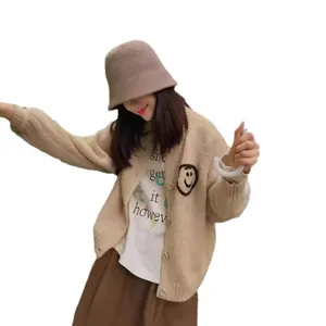 Beige knitted cardigan sweater featuring an embroidered smiley face for a casual look.