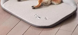 Close-up of cooling pet mat featuring breathable mesh texture and cute panda print detail