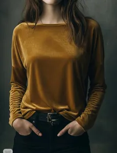 Detailed view of high-end mustard gold velvet fabric on a French style round neck loose top