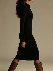 Side view detail of a black ribbed knit polo collar long sleeve midi dress.