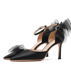 Elegante schwarze spitze High Heels mit Mesh-Schleife für Hochzeit oder Bankett