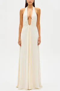 Elegant cream halter neck maxi dress with a deep plunge and draped waist detail