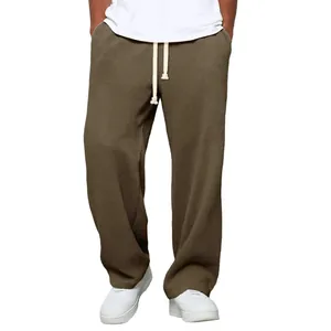 Détail du pantalon décontracté pour hommes en maille gaufrée olive, coupe ample droite