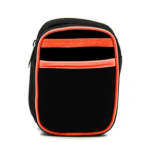 Detail of a small black sports pouch featuring a mesh front pocket and neon orange piping