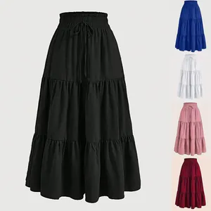 Detailed view of high-waisted tiered maxi skirt with drawstring in multiple colors