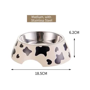 Medium cow print pet bowl with stainless steel insert, 18.5cm diameter detail