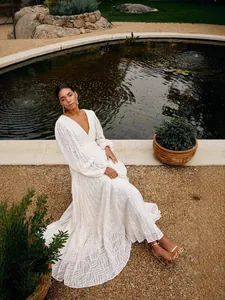 Elegant white jacquard pleated maxi dress with lantern sleeves and V-neckline
