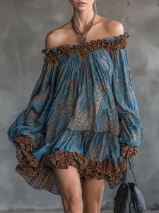 Close-up detail of this elegant blue leopard print ruffled off-the-shoulder mini dress