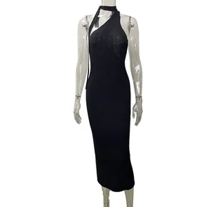 Detailed view of black one-shoulder bodycon midi dress on transparent mannequin.