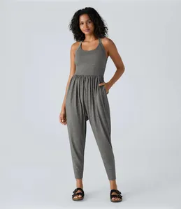 Front full-length view of women's casual grey sleeveless jumpsuit with cuffed ankles