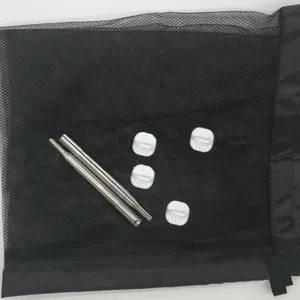 Portable black mesh pet safety gate with telescopic metal poles and adhesive hooks.