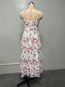 Back view detail showing the elegant lace-up design of this floral chiffon midi evening dress