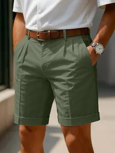 Men's olive green business casual chino shorts with pleated front and stylish cuffed hem