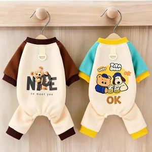 Two cute cartoon dog jumpsuits featuring built-in leash rings, perfect for small breeds