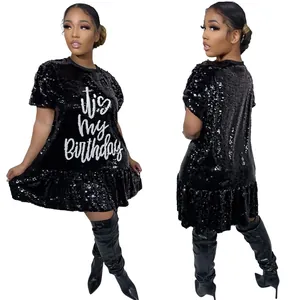 Front and back detail view of a black sequined short sleeve birthday dress with ruffled hem