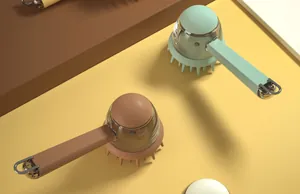 Detailed view of pet bath massage brushes with liquid dispensing feature in two colors