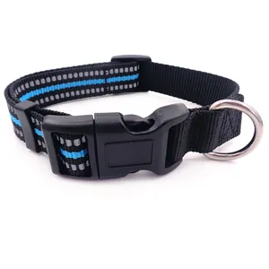 Close-up detail of a reflective black nylon dog collar with plastic buckle and ring