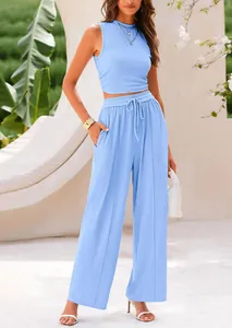 Detail view of light blue knitted two-piece set with sleeveless tank and wide leg pants