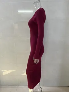 Detailed side profile of elegant burgundy ribbed knit long sleeve slim fit maxi dress for women