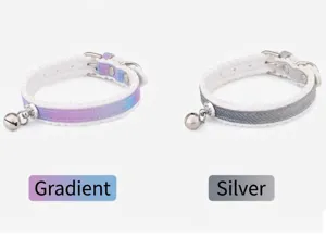 Detail view showing two pet collars with small bells in gradient and silver colors.