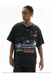 Detail shot of a vintage washed black T-shirt with a classic car graphic print.