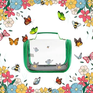 Detailed view of a transparent bird carrier bag with a green handle and floral border