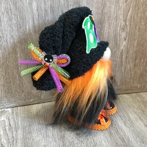 Detailed side view of a Halloween gnome with a 'BOO' hat and orange beard