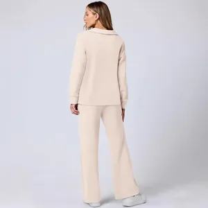 Back view of apricot casual two-piece lounge set with long sleeve top and wide leg pants